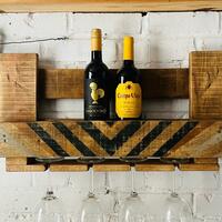 Wall-mounted reclaimed wood wine rack