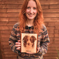 Myself holding a wood burned collie on lime 