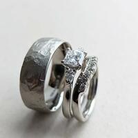 Platinum and diamond wedding rings made by the couple themselves