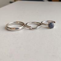 Platinum and diamond wedding rings made by the couple themselves