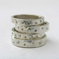 Anna K Baldwin Dimpled wlim and wide silver rings with scatter diamonds