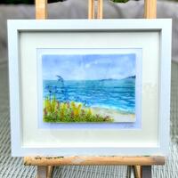 Flowers by the sea, fused glass framed picture.