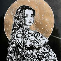 Winter Mistress is a black and white lino printed image with a gold circle in the background. The subject is a women with long hair cradling an artic fox. The details in the golden circle are winter floras.