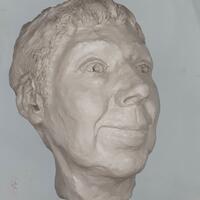 Portrait sculpture head of Caroline with cropped hairstyle, clay, by Joanna Stone.