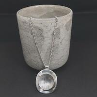 Silver sculptured pendant