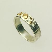Silver and gold spot ring