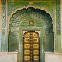 Golden Door with Green arches. One of the four colourful doors in the City Palace, Jaipur, Rajasthan (India).