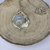 Ring – Sterling silver reticulated leaves and rainbow moonstone setting