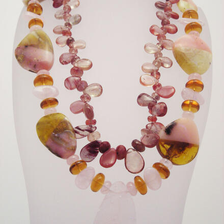 Natural gems form two necklaces.