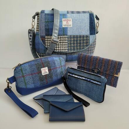 A selection of handmade blue bags and accessories