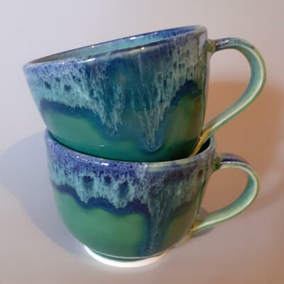 Hand thrown cups in porcelain with Copper Green Glaze