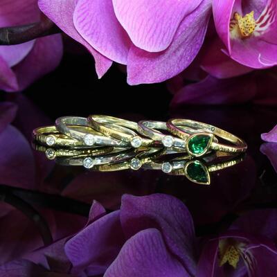 silver & gold diamond rings with emerald