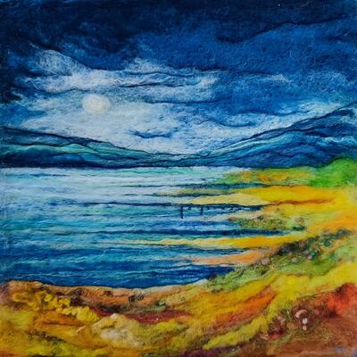 Moon light on the loch created with felted wool and embroidery in blues, ochres and greens.