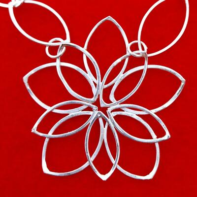 Peony pendant in sterling silver with hand-crafted chain and clasp.
