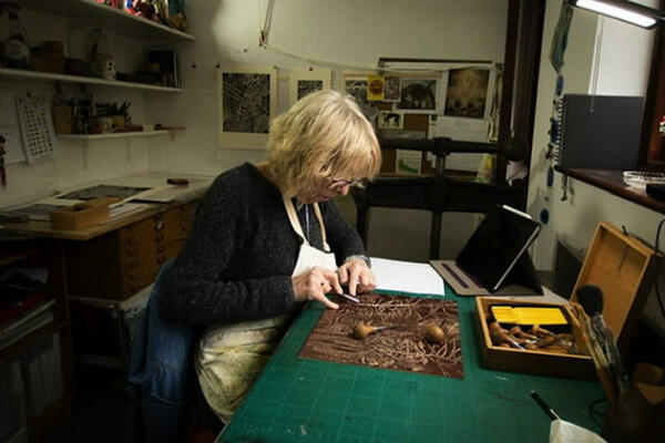 Helen a Taylor working in home studio