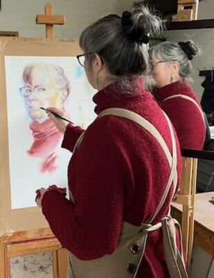 Artist Joanna Stone at work in her studio.