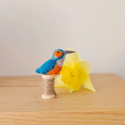 Creature Crafts: Miniature kingfisher ornament made using needle felting and hand sculpted clay for beak and feet.