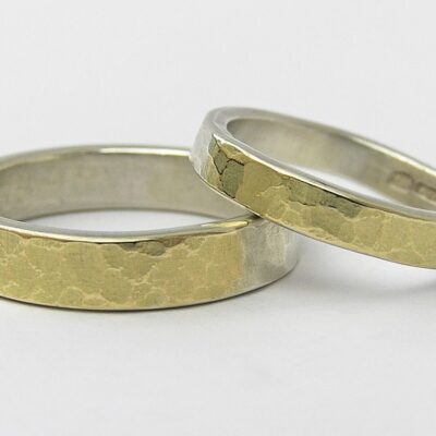 Anna K Baldwin: Anna K Baldwin Dimpled bands 9ct white overlaid with 18ct yellow gold