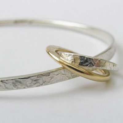 Anna K Baldwin: Anna K Baldwin Nexus heavy drop bangle in silver and 9ct gold