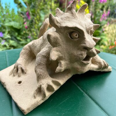 Edith Garraway: Stoneware lion gargoyle shed roof tile