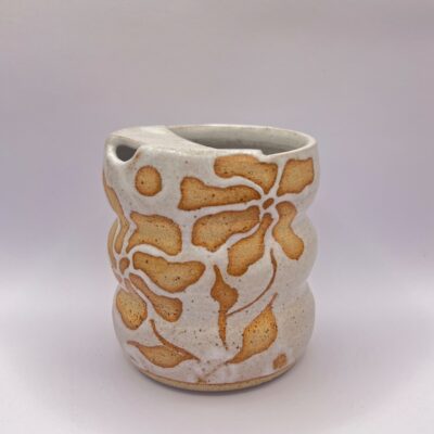 Leah Hall - Ceramics: Wax resist portable coffee cup