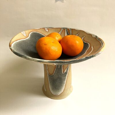 Sally Dorrity: dish on tall foot, stoneware, dry green glaze