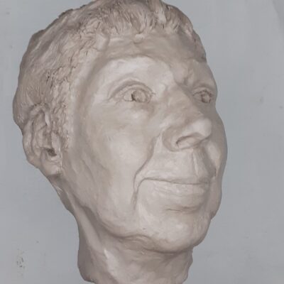 Joanna Stone: Portrait of Caroline with short hair. Clay, unfired state.