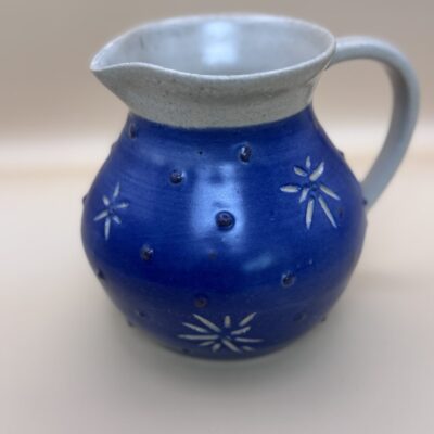 Fiona Wilcock: Milk jug. Slip coated and carved. Stoneware.