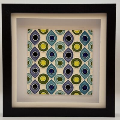 Fiona Wilcock: Framed tile based on The Book of Kells, a sacred manuscript.