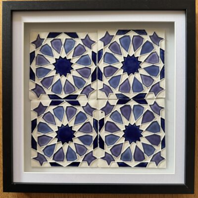 Fiona Wilcock: Framed porcelain tiles using a twelvefold rosette design