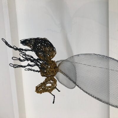 Lindsay Neale Waring - Sculptor: When i was asked to participate in an entry to Taton RHS Flower show I felt enormous gratitude to be working with a many time winner in the show. After much discussion with garden designer Clive Scott we decided on 20 Manchester Bees spiralling up in a cacophony of floral musicality. 20 bees to celebrste Tatons twentieth year of the flower show. Manchester bees to comply woth the theme from the RHS for that year and the title? “Rhapsody in Blue” to highlight the ecological theme. Bees are naturally drawn to blue hues first and so Clive’s planting reflected this with an abundance of blue and purple flowers and grasses. What fun we had! We were even featured on the BBC! Clive done a magnificent job and the garden received a Silver Guilt award. I was proud to be a small part in this.