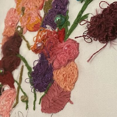 Deborah Humm: Untangled Flowers. Embroidered journey of thought, with embellishments within box frame 33x33cm